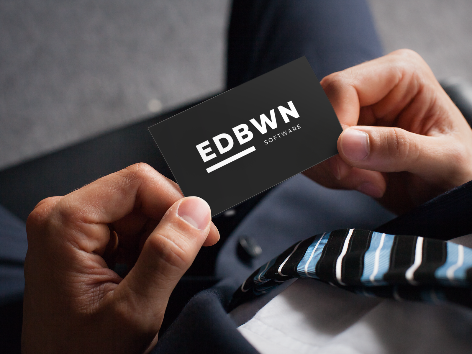 Business card with the EDBWN Software logo